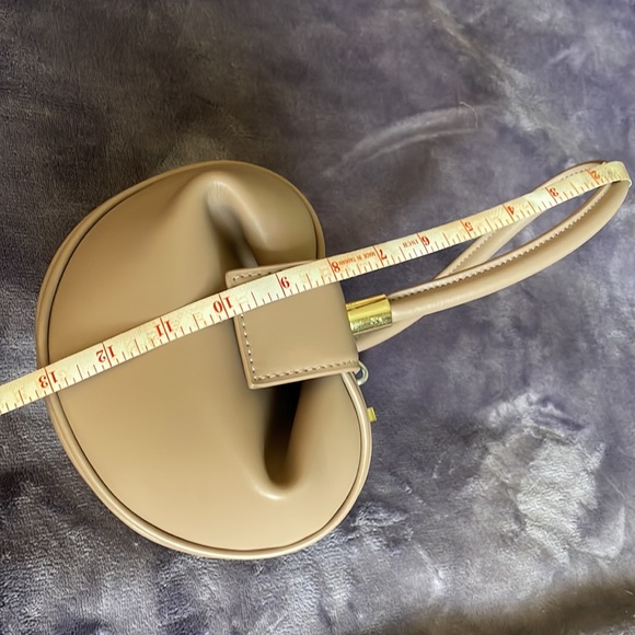 Beige small dumpling hobo bag I purchased brand new and never used. - Picture 5 of 11